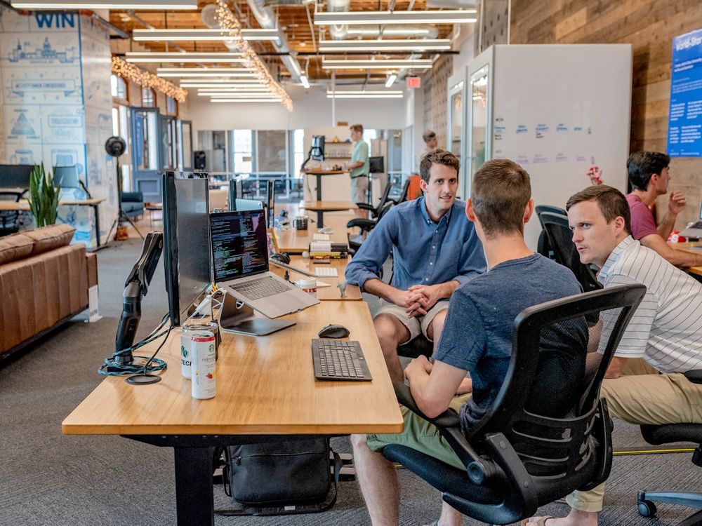 Professionals collaborating around a table